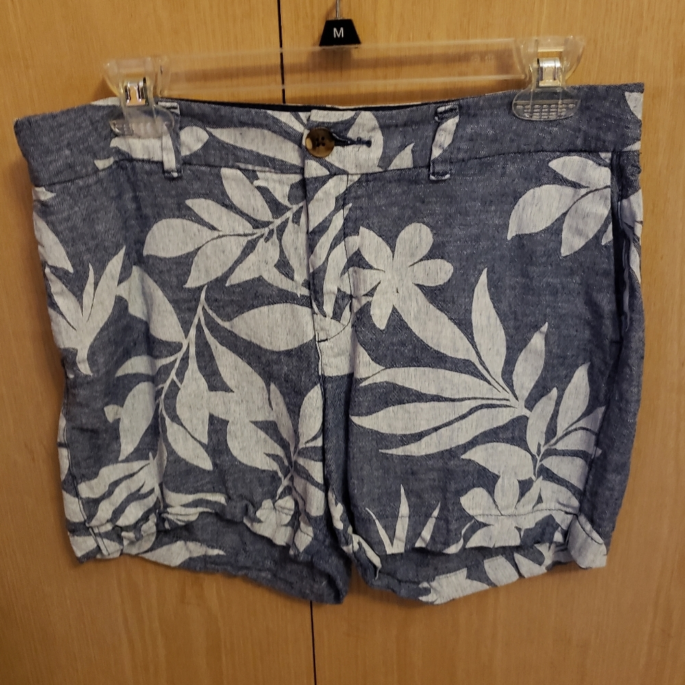 Hawaiian print shorts.